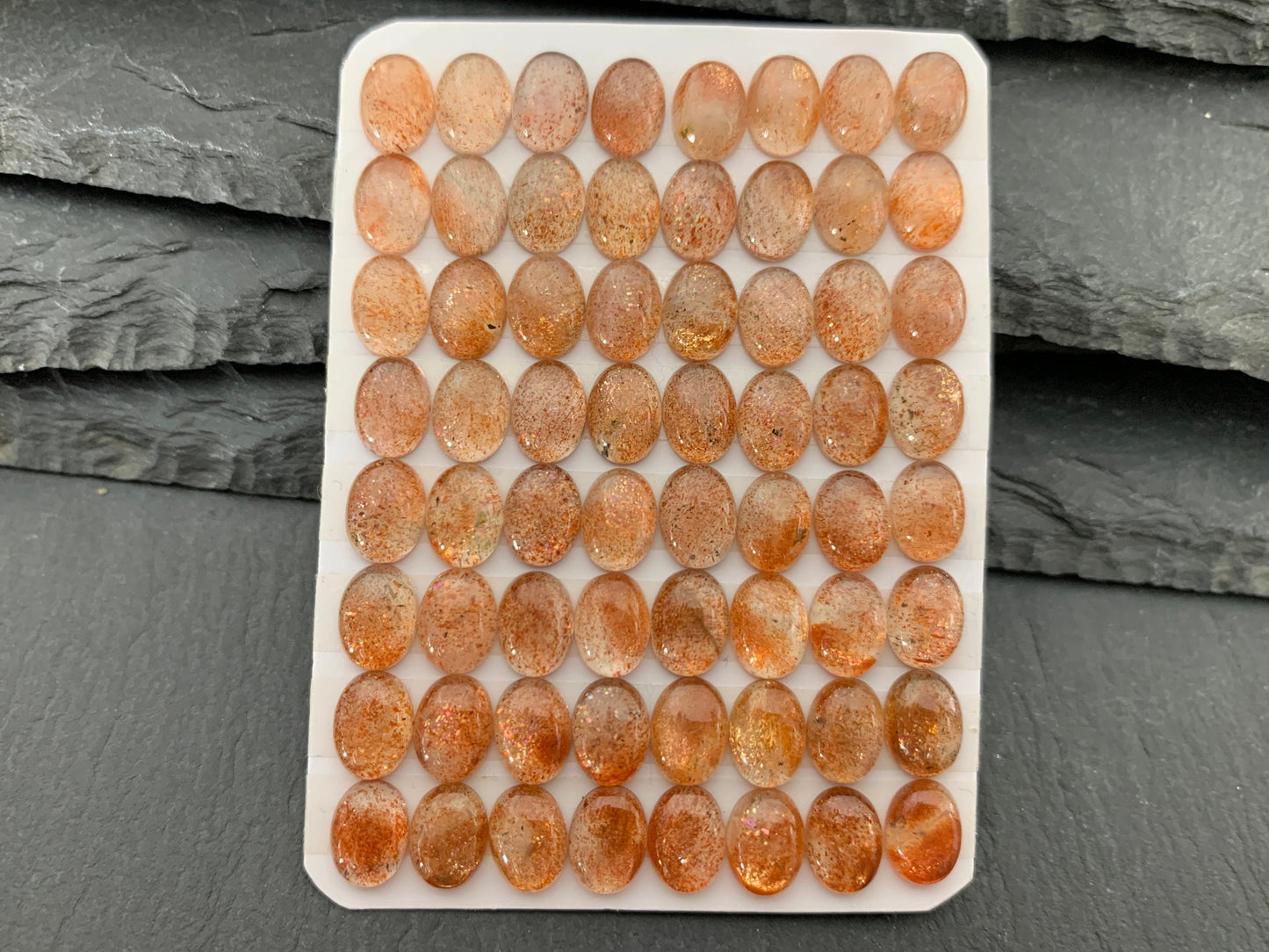 Sunstone oval 6x8mm cabochon