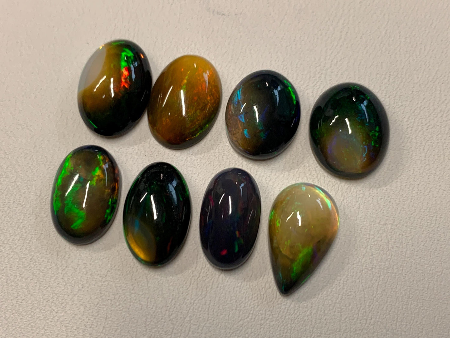 Natural Ethiopian Black Opal oval, pear 13-15mm long cabochon