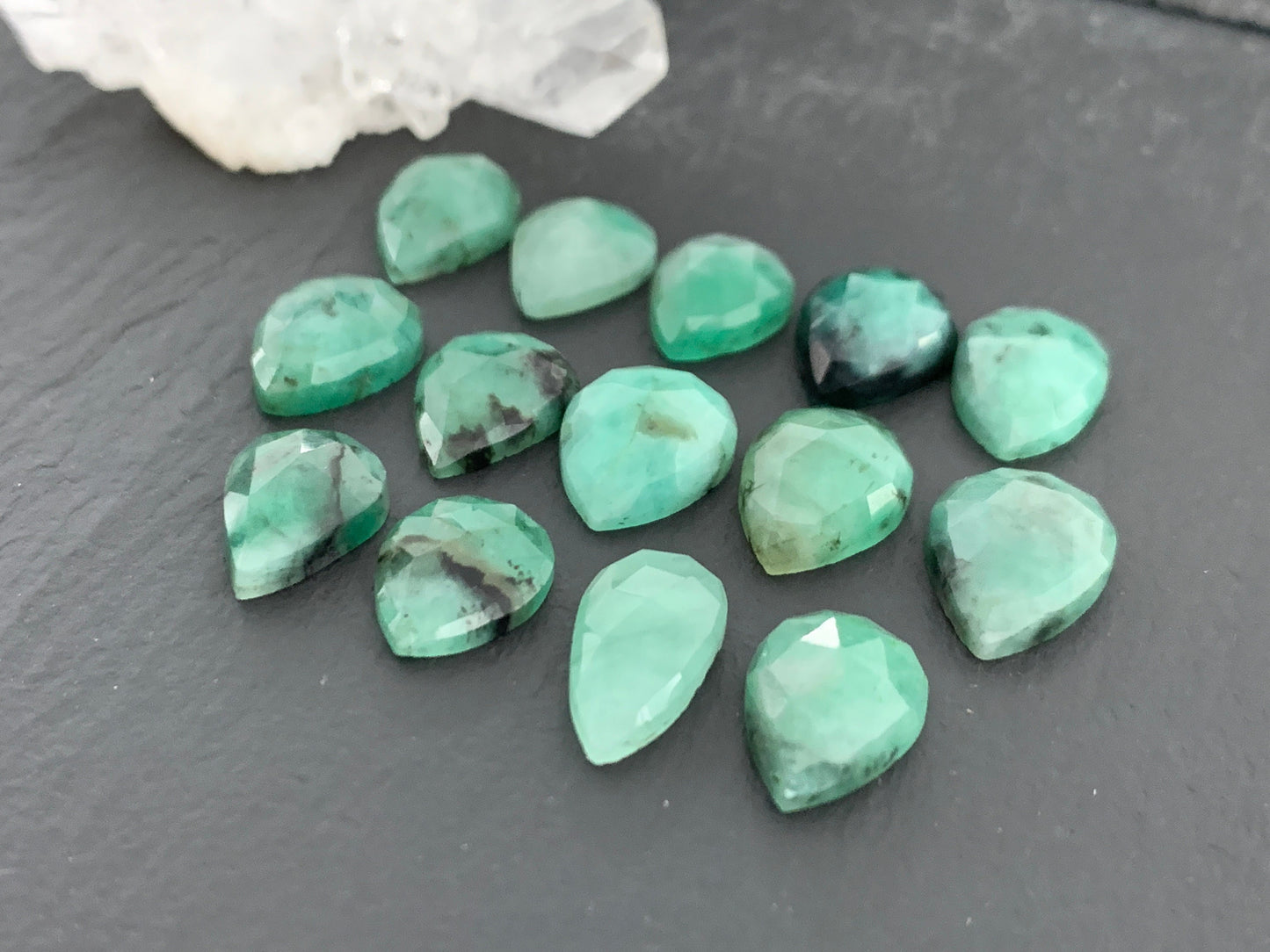 Faceted Emerald pear 11-13mm long cabochon