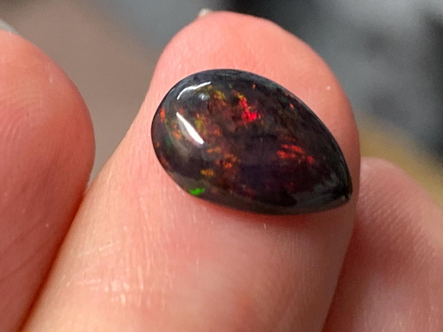 Natural Ethiopian Black Opal 8x11x4mm cabochon