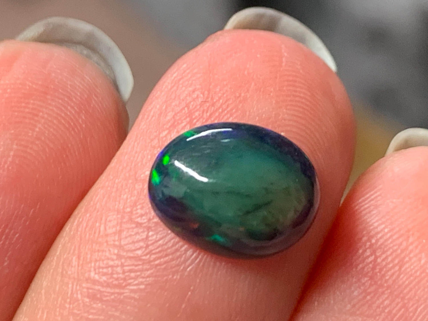 Natural Ethiopian Black Opal 8x10x4mm cabochon