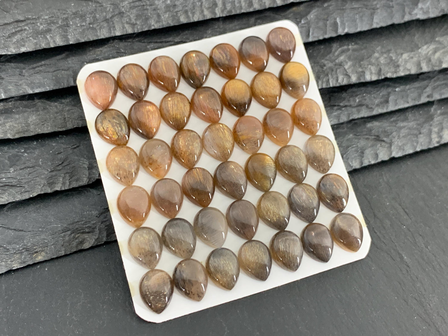 Gold Sunstone pear 8x10mm cabochon