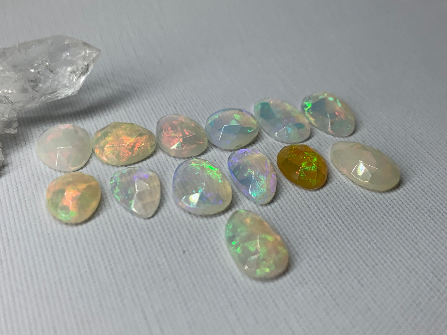 Faceted Ethiopian Opal 10-12mm long cabochon