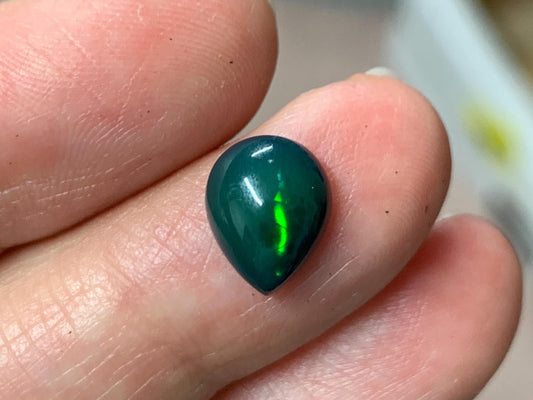 Black Ethiopian Opal pear 8x10x4mm cabochon