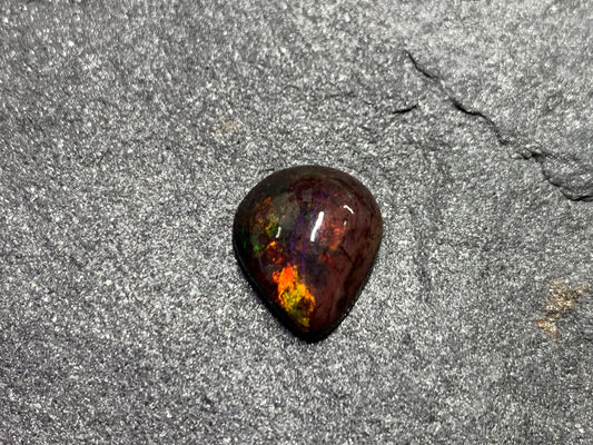 Black Ethiopian Opal pear 10x12x4mm cabochon