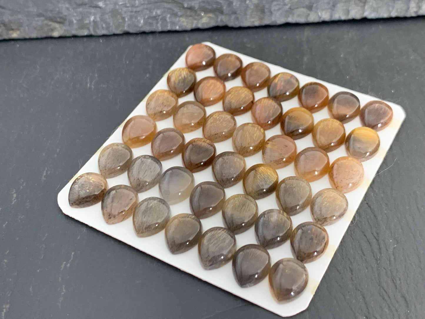 Gold Sunstone pear 8x10mm cabochon