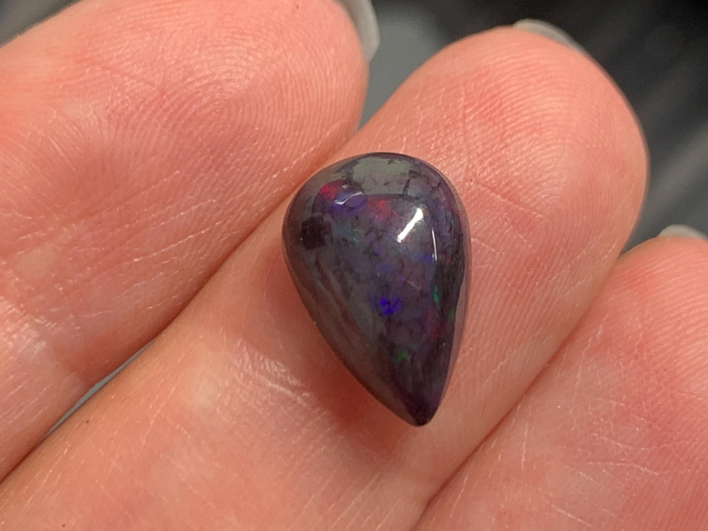 Natural Ethiopian Black Opal 8x13x4mm cabochon