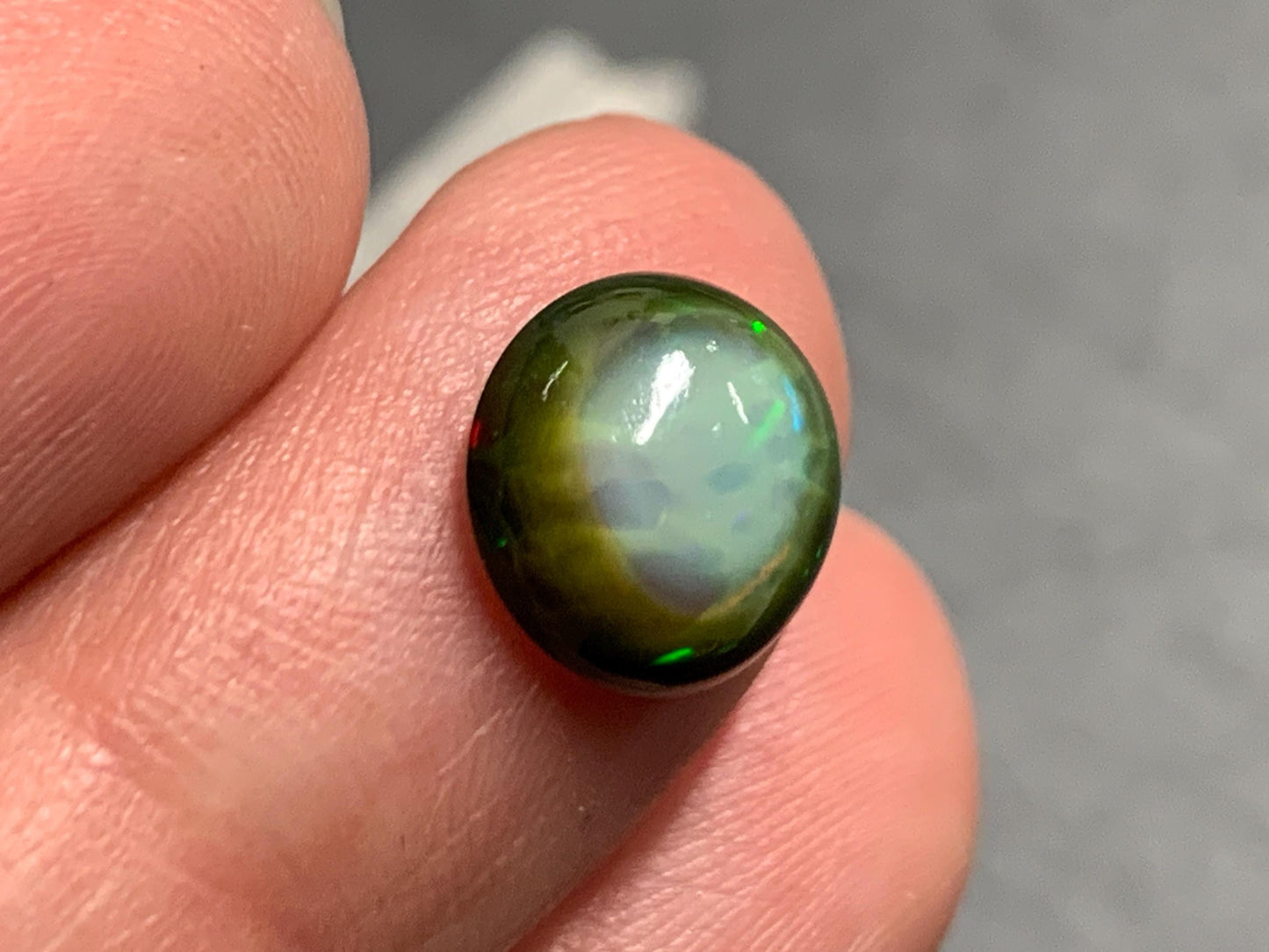 Natural Black Ethiopian Opal round 9.5x9.5x4mm cabochon