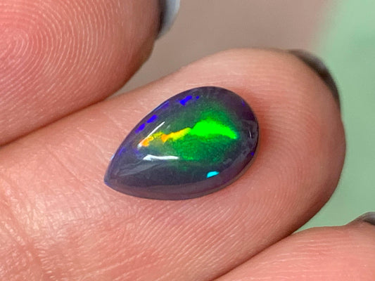 Natural Ethiopian Black Opal 7x11x4mm cabochon