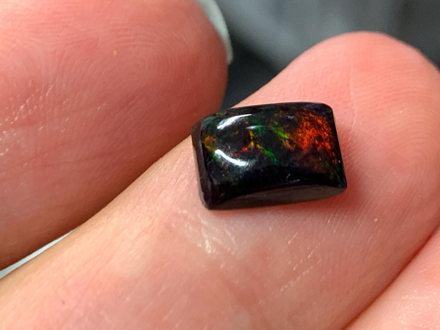 Natural Ethiopian Black Opal 6x8x3mm cabochon