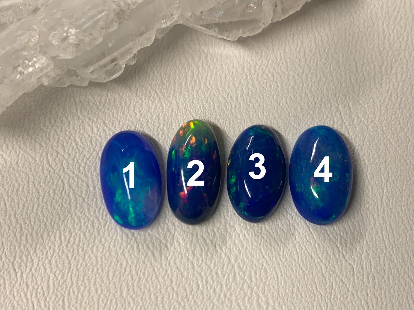 Ethiopian Opal oval 11-12mm long cabochon - Natural Opal smoked to blue color