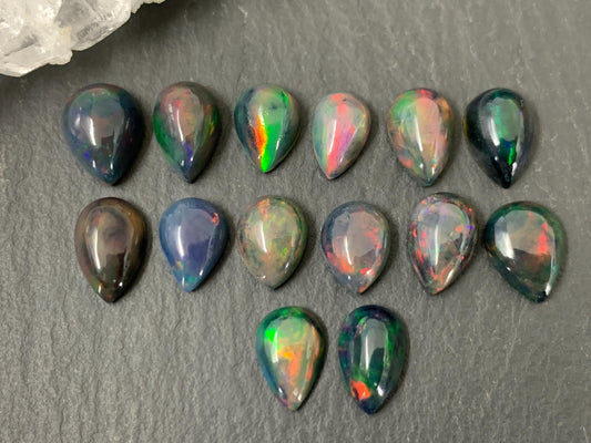 Black Ethiopian Opal pear 6x8mm cabochon