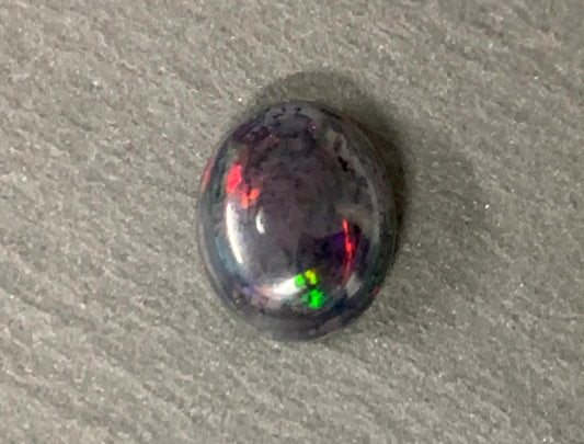 Black Ethiopian Opal 9x11x5mm cabochon