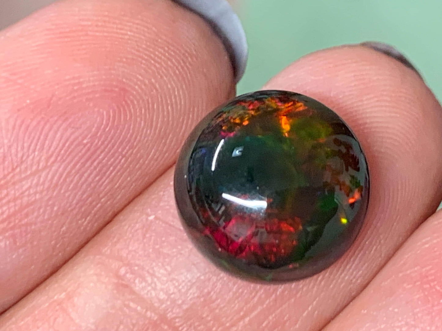 Natural Ethiopian Black Opal 12x5mm cabochon