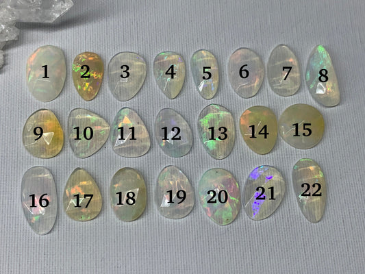 Faceted Ethiopian Opal 11-16mm long cabochon