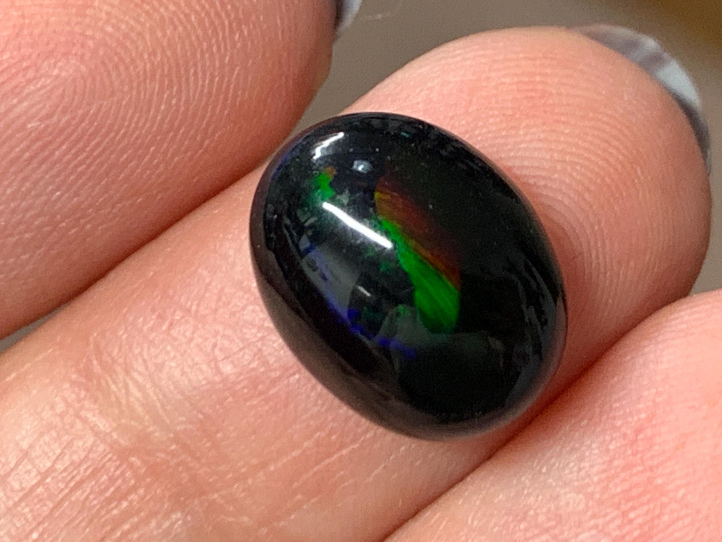 Natural Ethiopian Black Opal 10x12x5mm cabochon