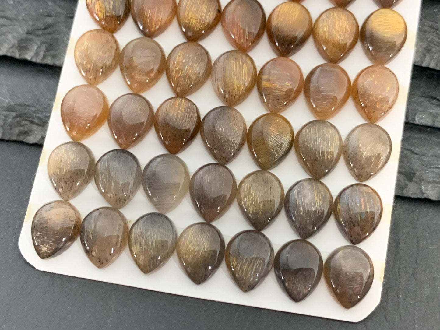 Gold Sunstone pear 8x10mm cabochon