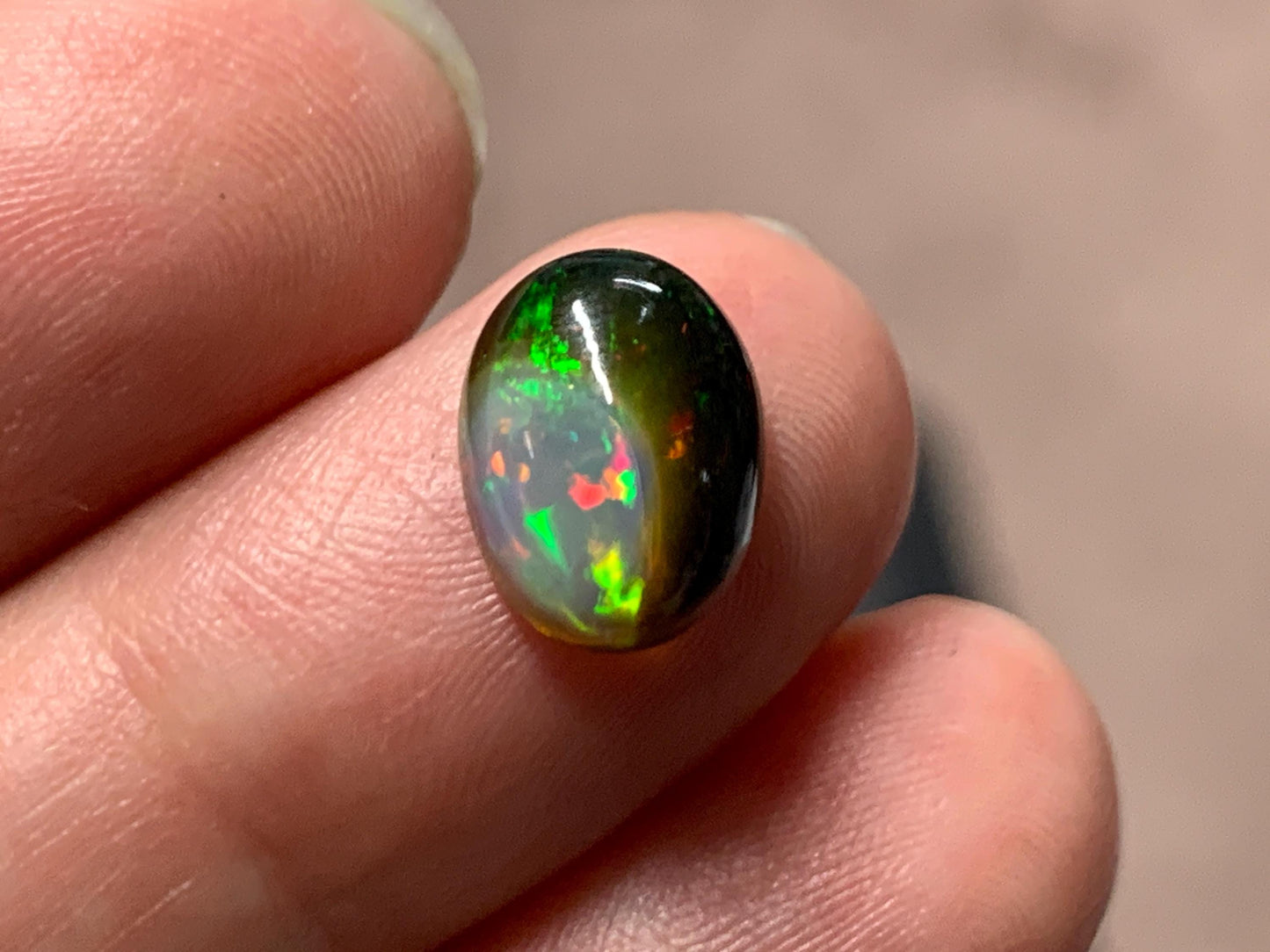 Natural Black Ethiopian Opal oval 8x11x4mm cabochon