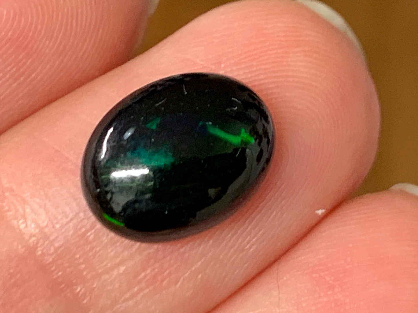 Natural Ethiopian Black Opal 8x11x3.5mm cabochon