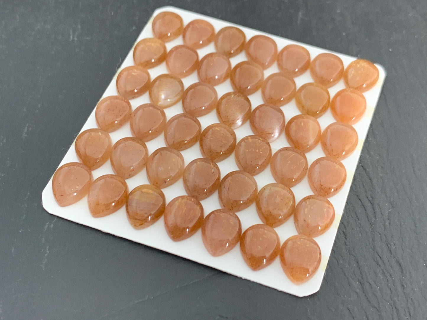 Gold Sunstone pear 8x10mm cabochon