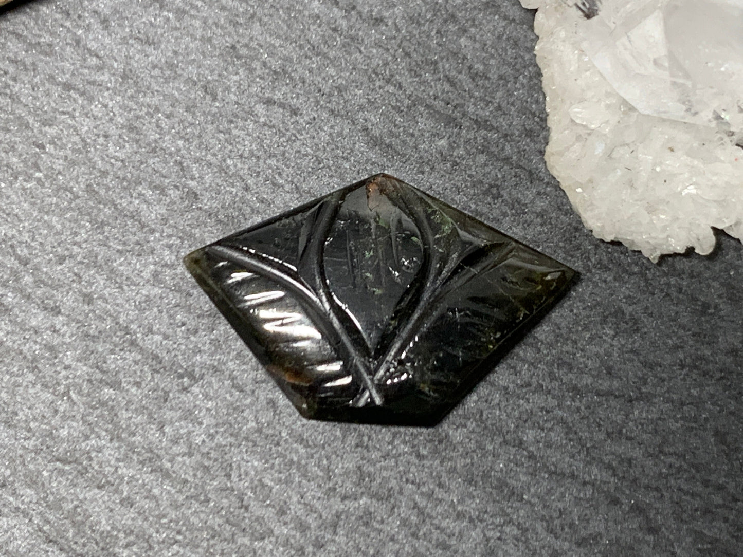 Carved Tourmaline 12x18x2mm cabochon