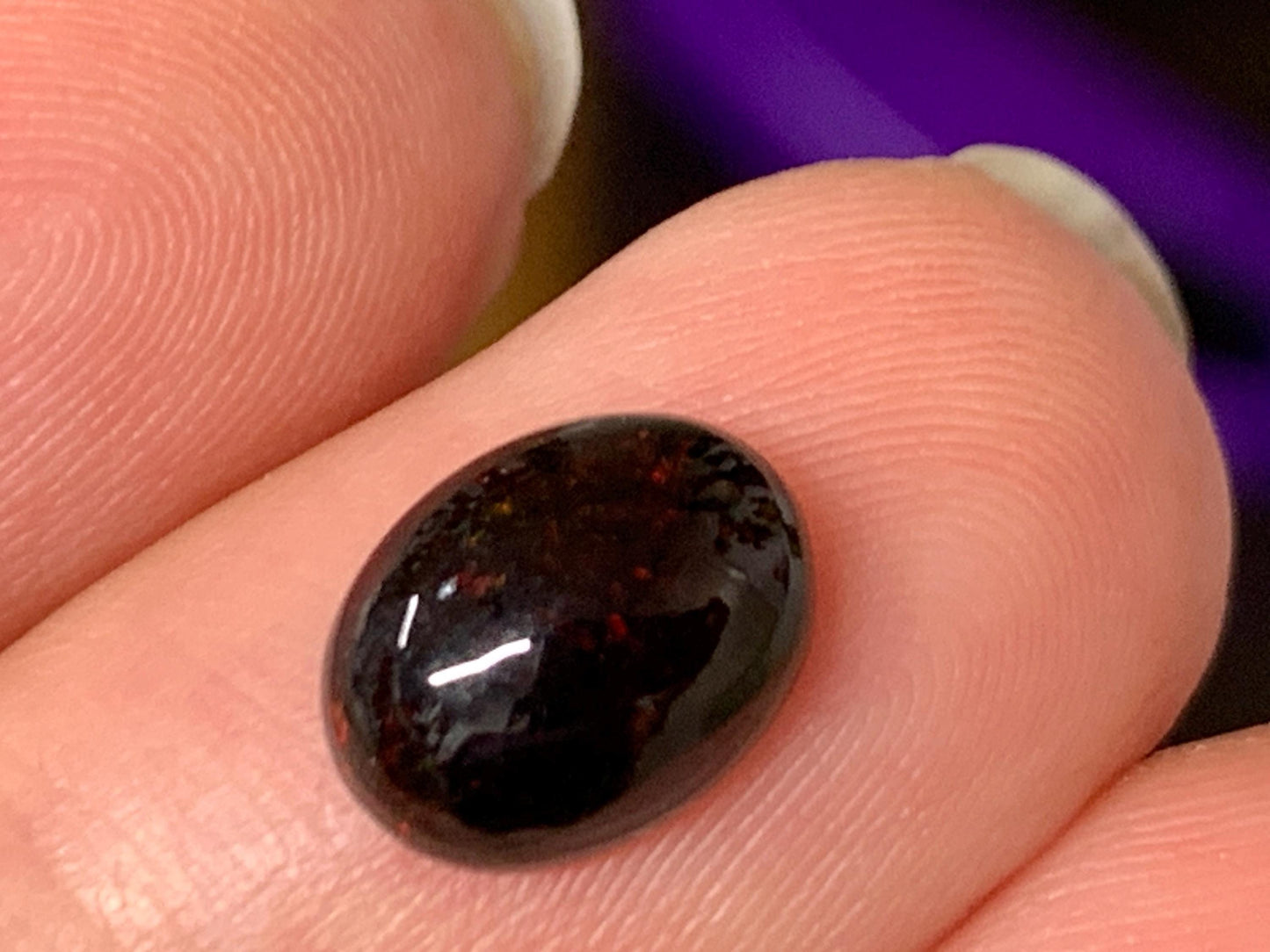 Natural Ethiopian Black Opal 7x9x4mm cabochon