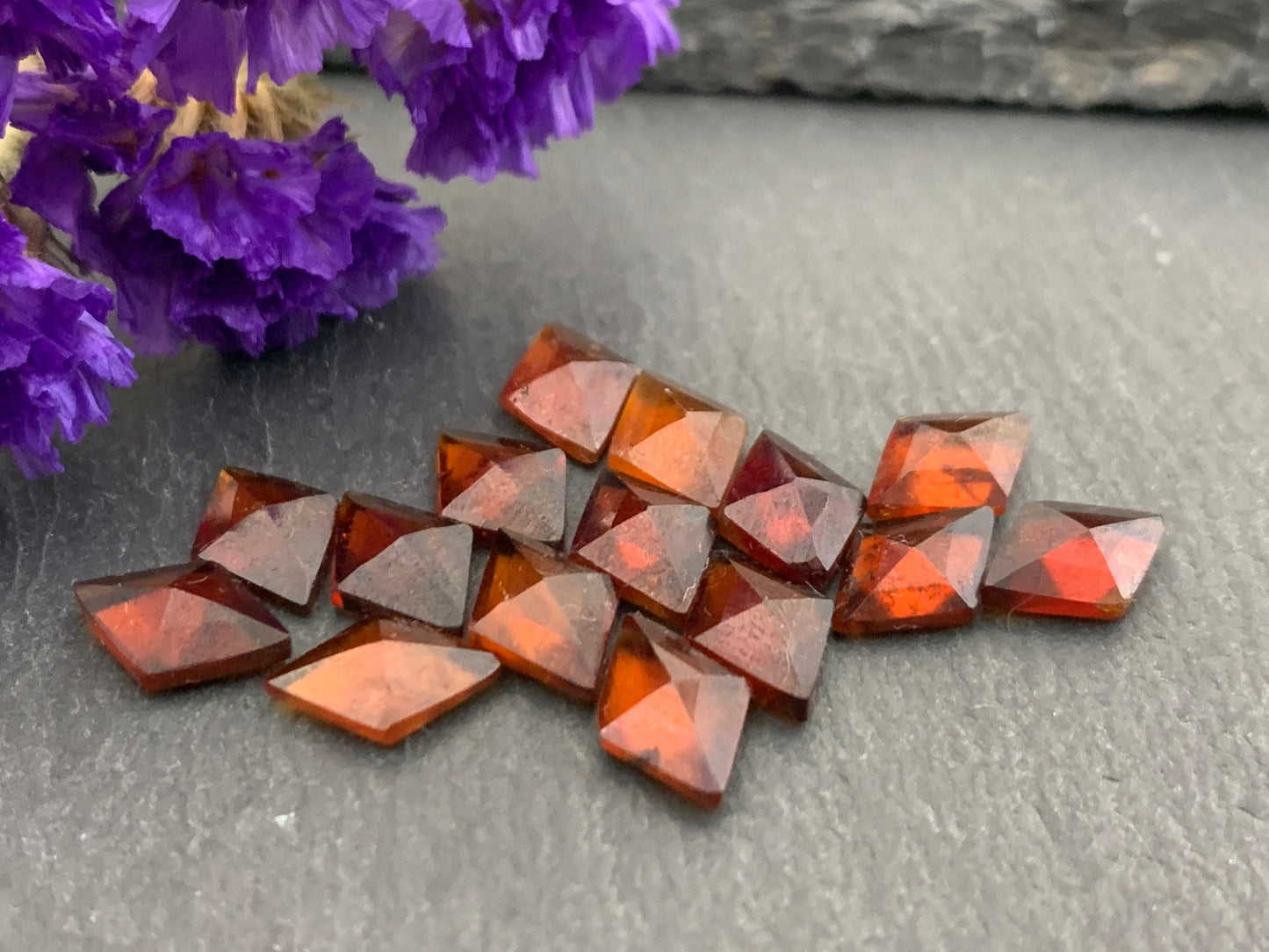 Faceted Hessonite Garnet rhombus 7x10mm cabochon