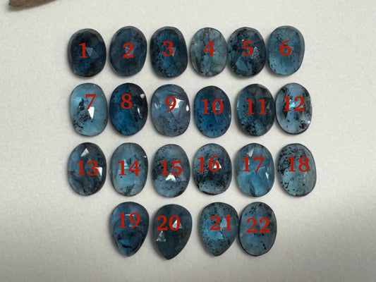 Faceted Moss Kyanite pear, oval 10x14mm cabochon
