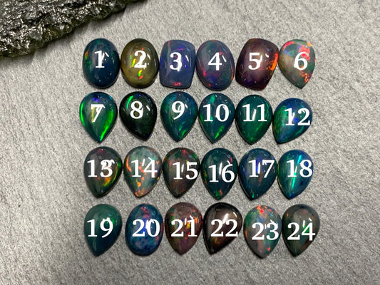 Black Ethiopian Opal 6x8mm cabochon