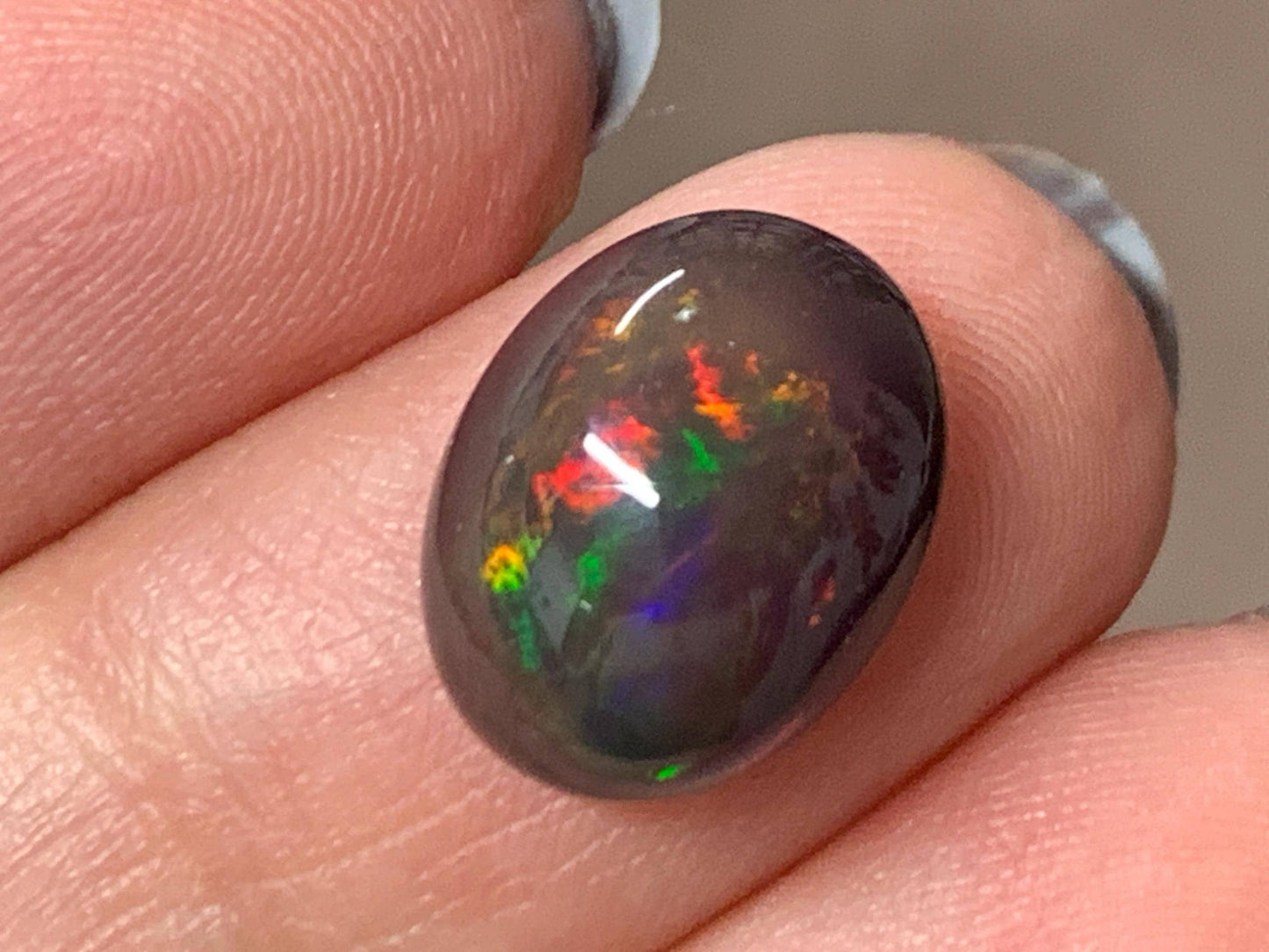 Natural Ethiopian Black Opal 10x13x5mm cabochon