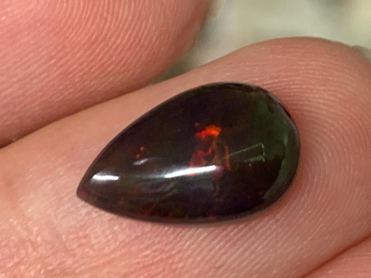 Natural Ethiopian Black Opal 8x13x4mm cabochon