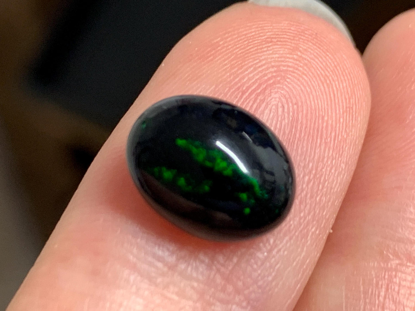 Natural Ethiopian Black Opal 8x11x4mm cabochon