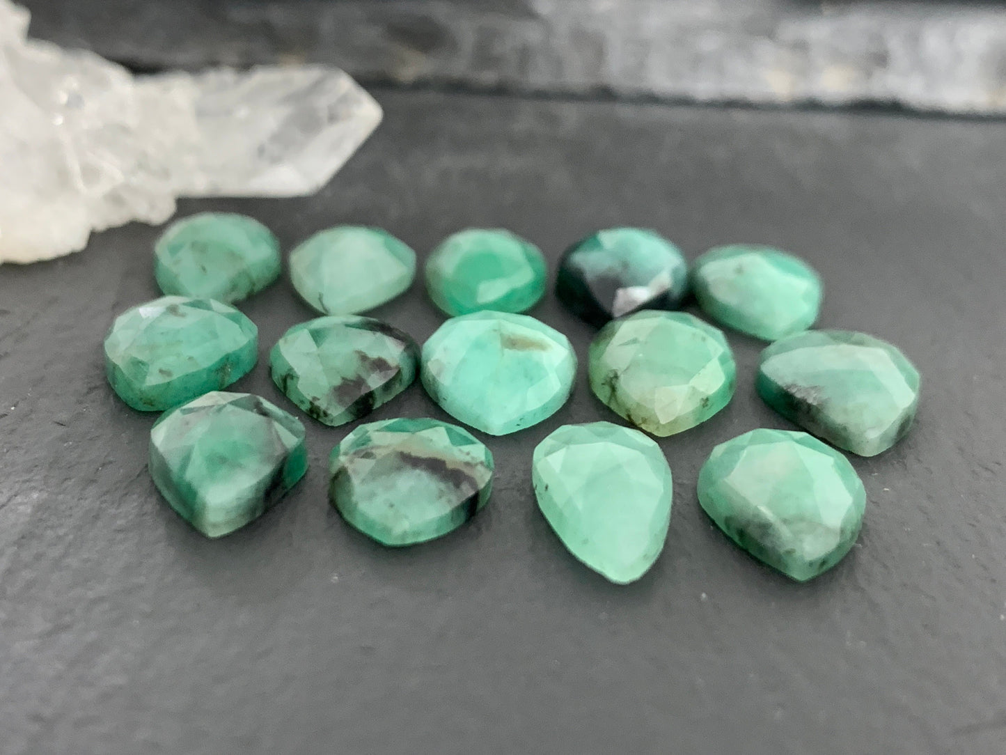 Faceted Emerald pear 11-13mm long cabochon