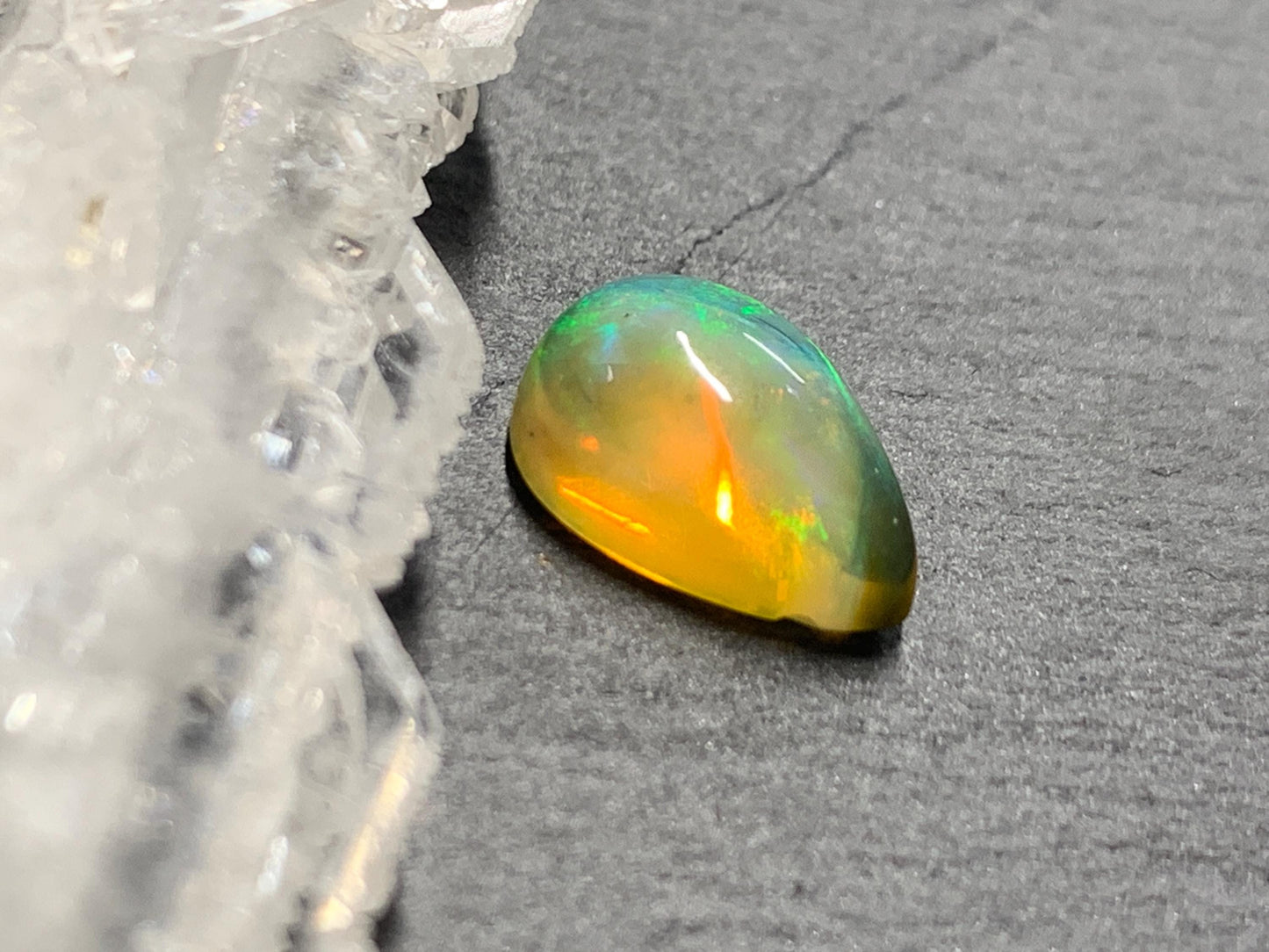 Natural Black Ethiopian Opal pear 8x11x5mm cabochon