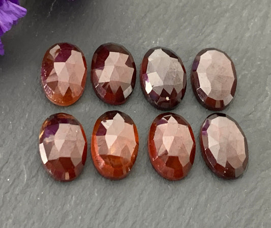 Faceted Hessonite Garnet oval 8x12mm cabochon