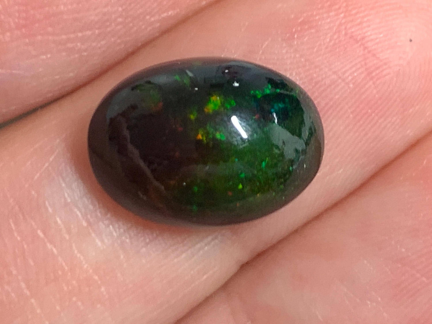 Natural Ethiopian Black Opal 10x14x6mm cabochon