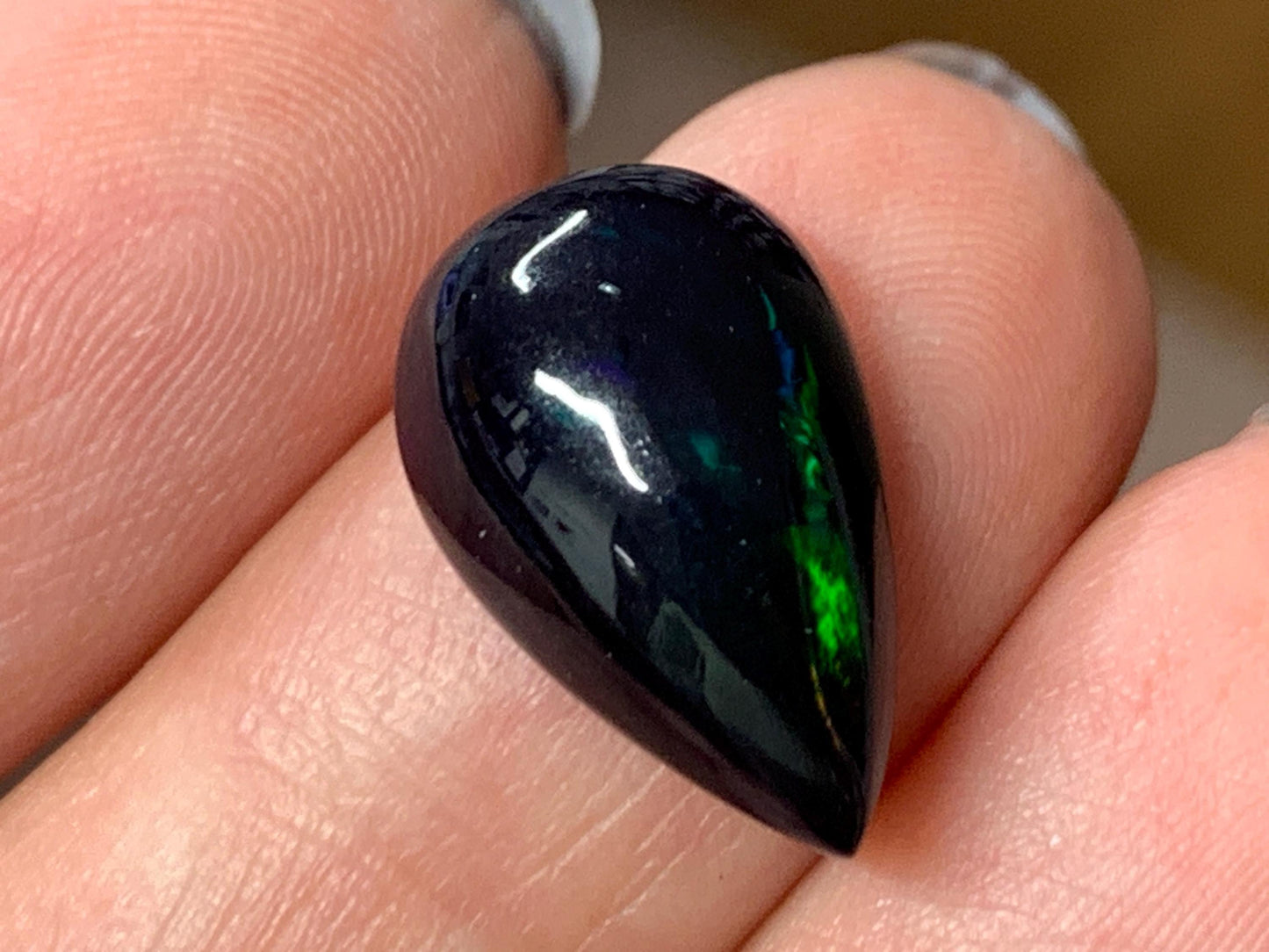 Natural Ethiopian Black Opal 10x16x5mm cabochon