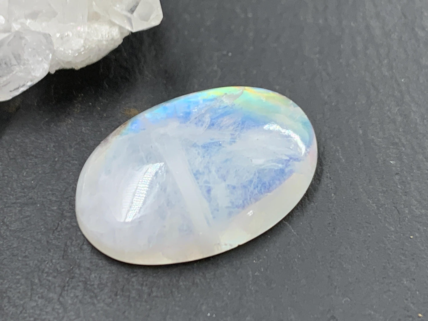 Rainbow Moonstone oval 23x16x6mm cabochon