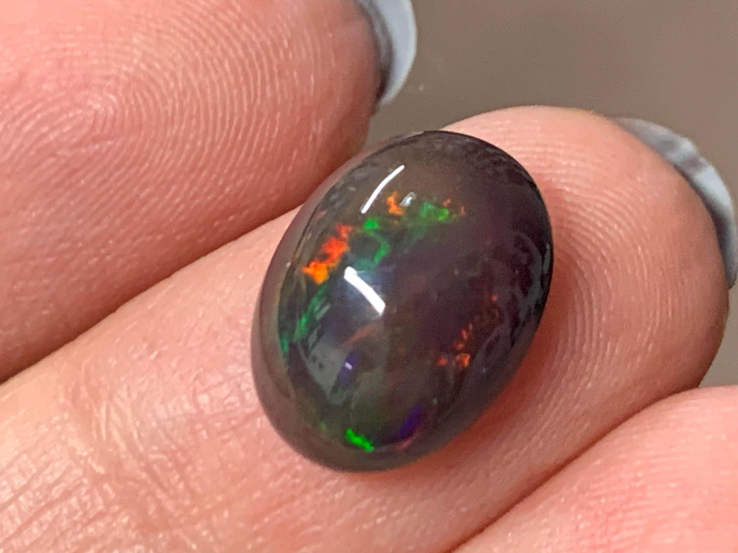 Natural Ethiopian Black Opal 10x13x5mm cabochon