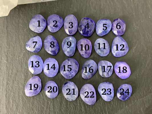 Discounted Damaged Faceted Tanzanite 8-10mm long cabochon