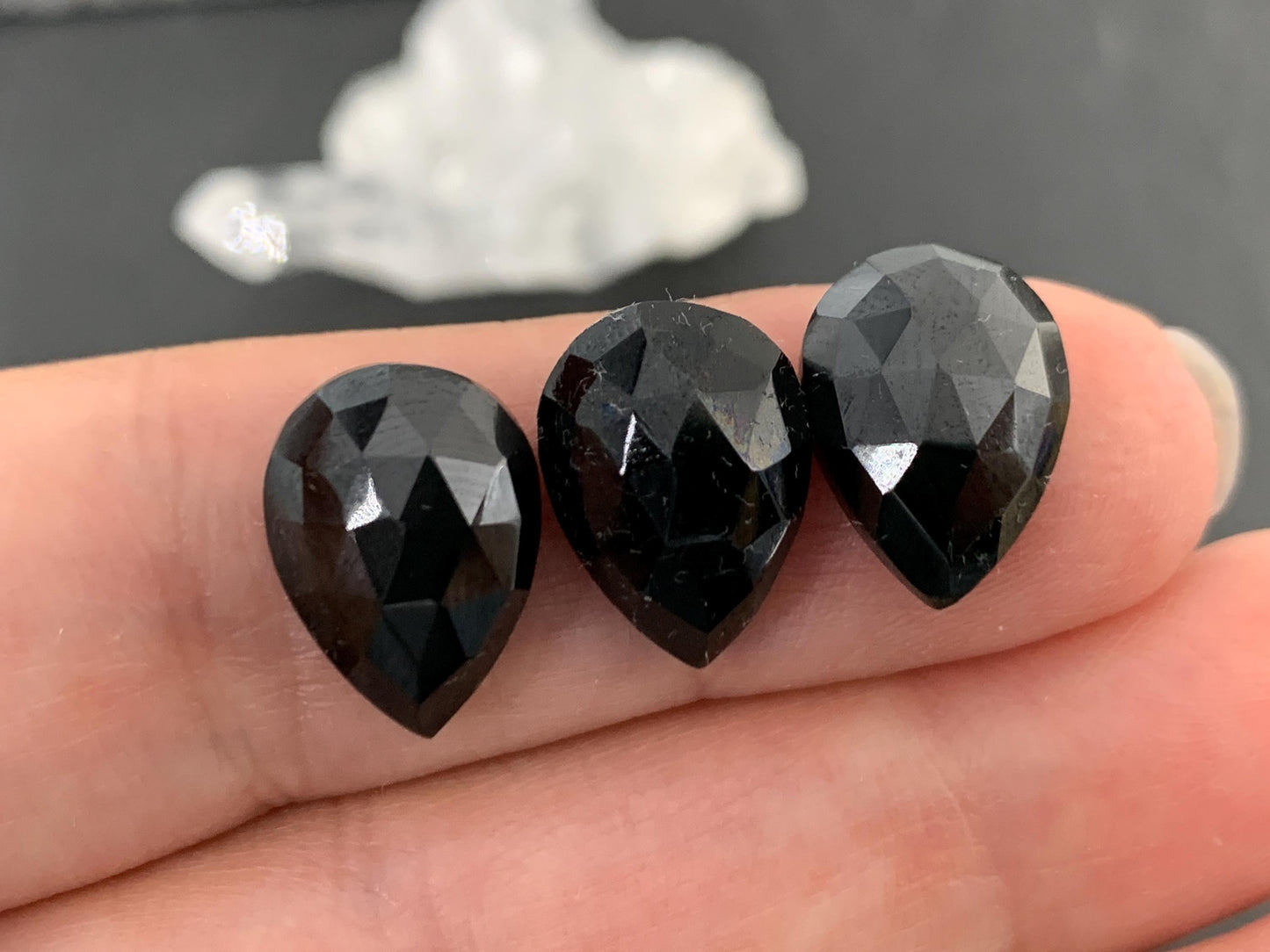 Faceted Black Spinel pear 10x14mm cabochon