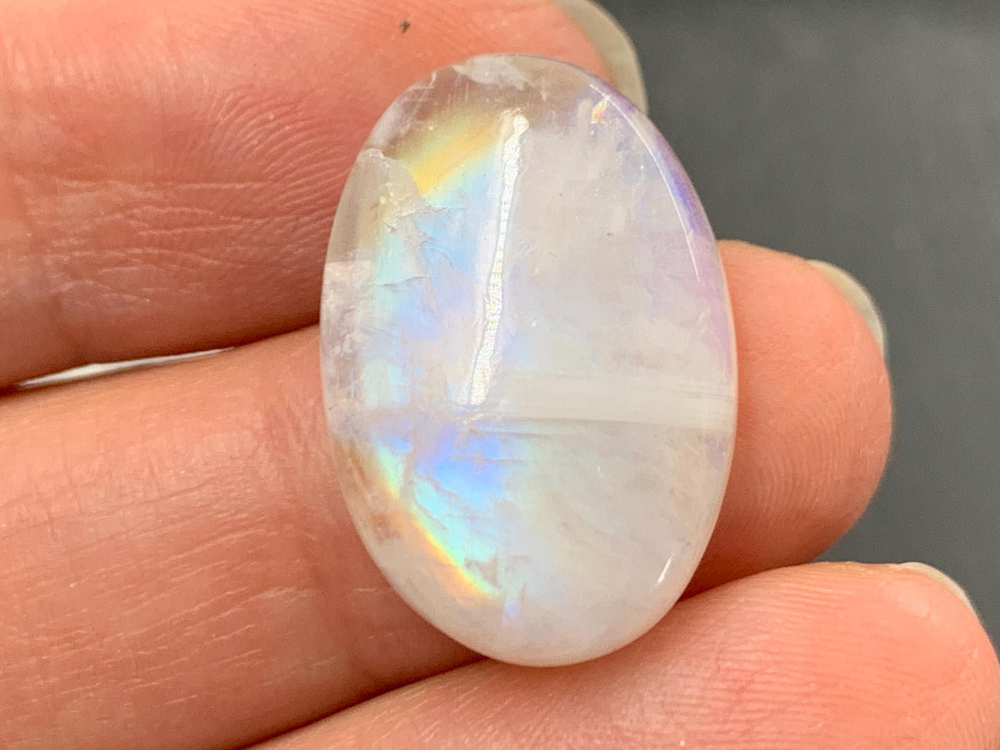 Rainbow Moonstone oval 23x16x6mm cabochon