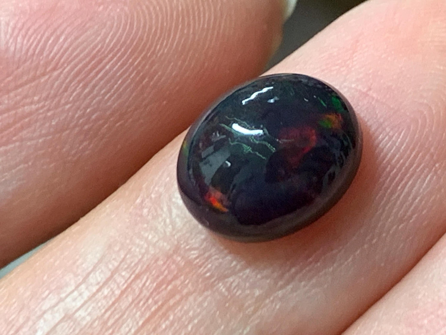 Natural Ethiopian Black Opal 8x10x5mm cabochon