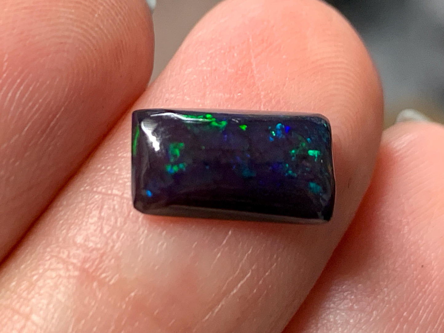 Natural Ethiopian Black Opal 6x11x3mm cabochon