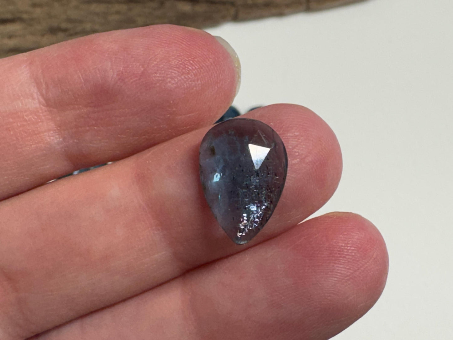 Faceted Moss Kyanite pear 10x14mm cabochon