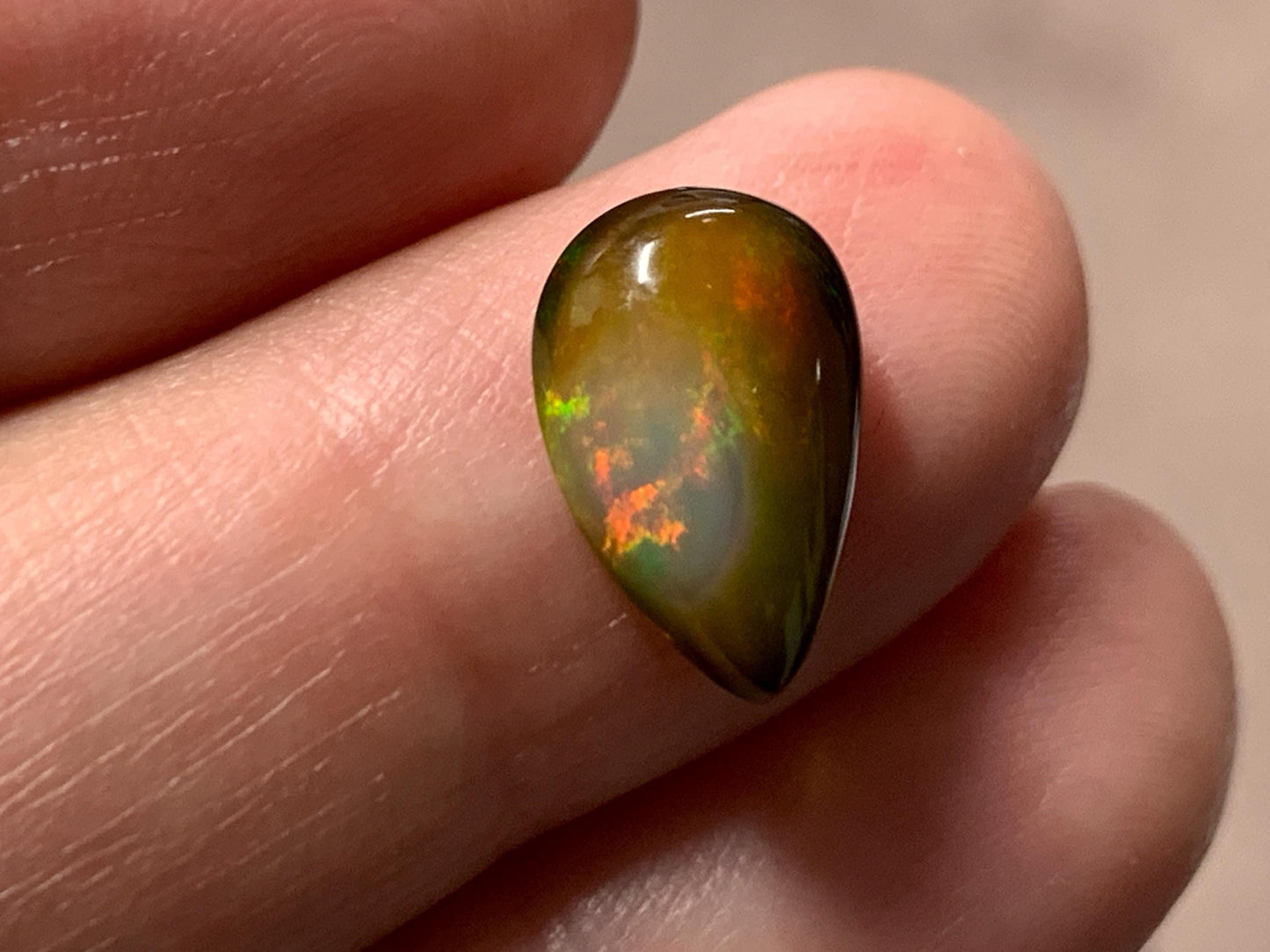 Natural Black Ethiopian Opal pear 8x13x4mm cabochon