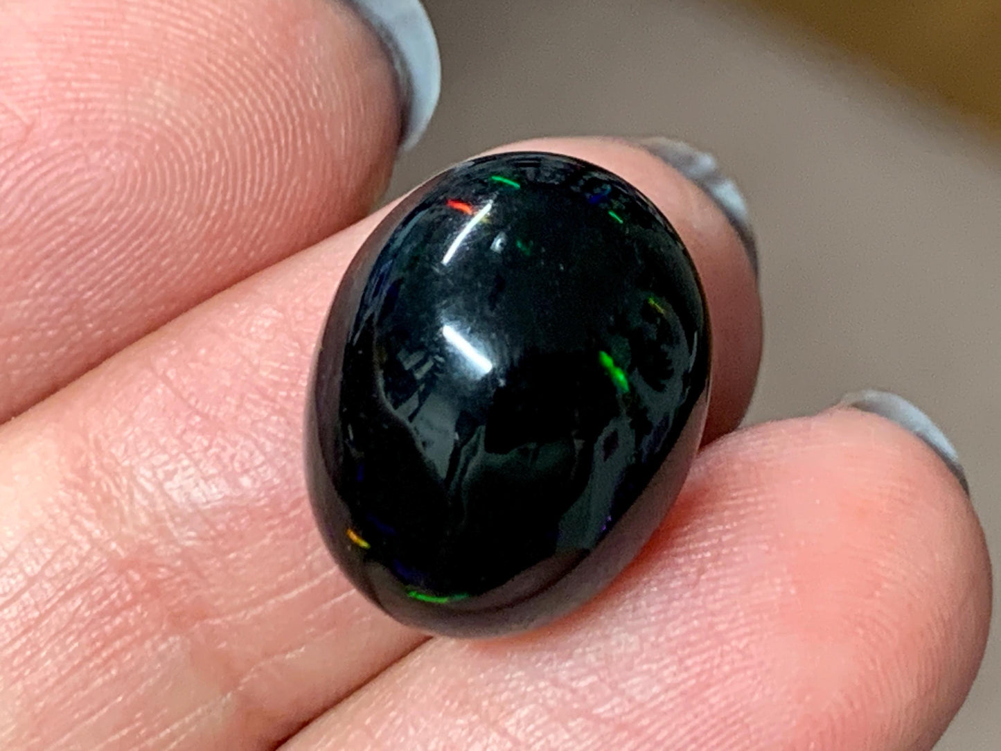 Natural Ethiopian Black Opal 13x16x5mm cabochon
