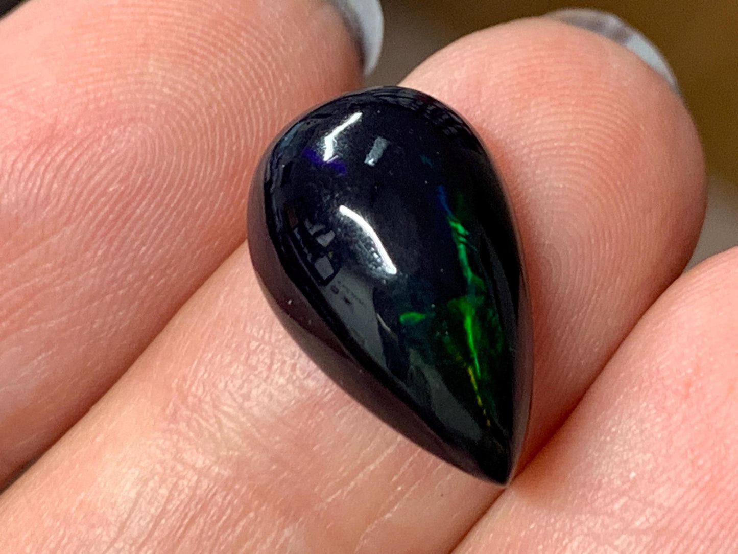 Natural Ethiopian Black Opal 10x16x5mm cabochon