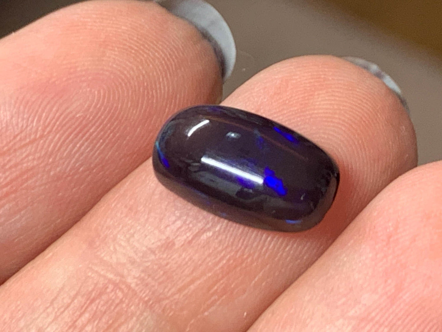 Natural Ethiopian Black Opal 7x13x4mm cabochon