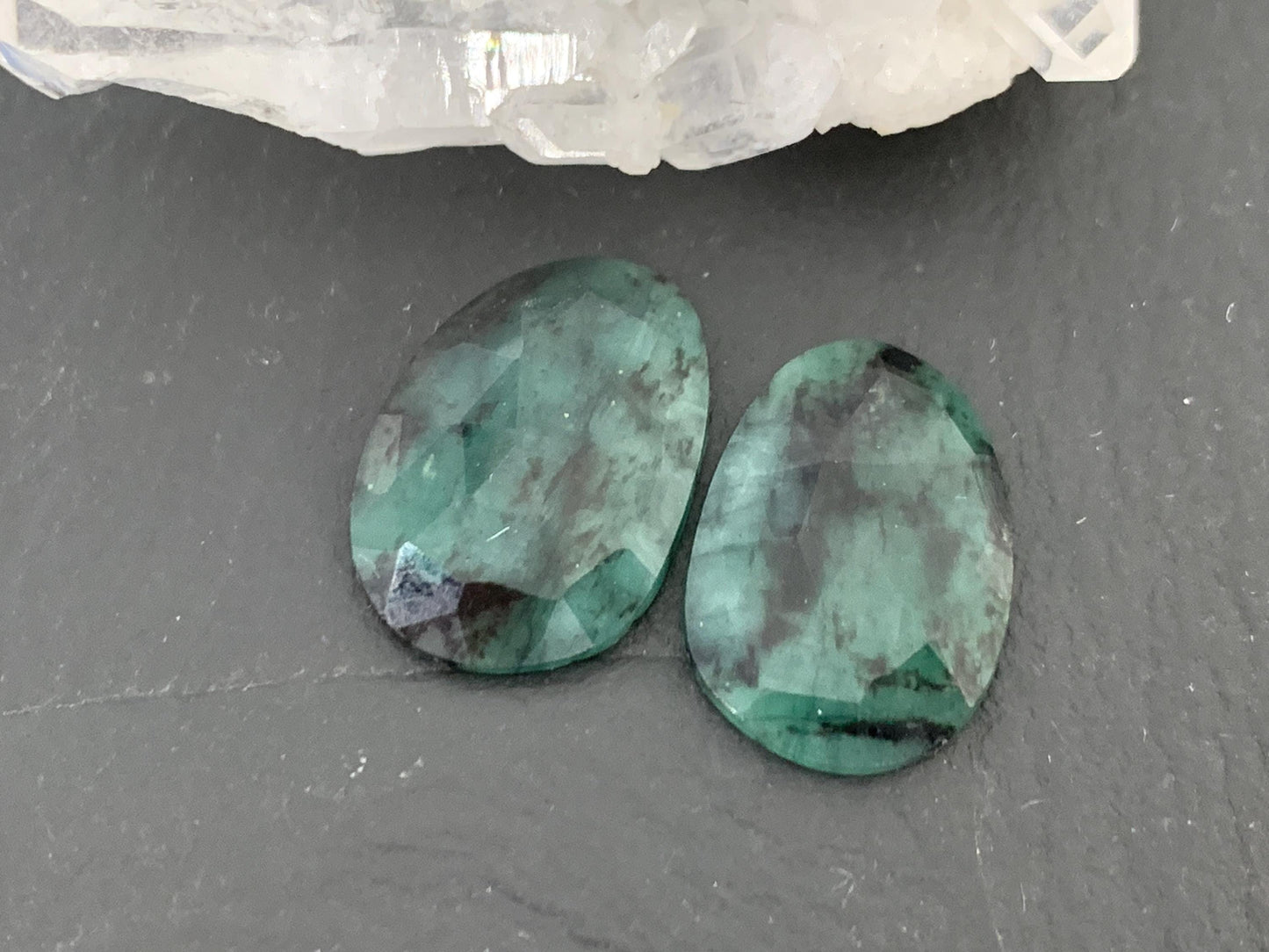Faceted Emerald Pair 12x17x3mm cabochon